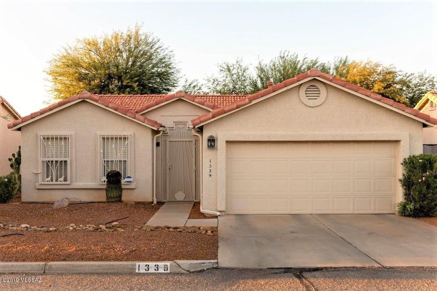 Perfect house in perfect location. Situated right on the Mountain bike path for easy access to U of A, and just around the corner from the UA Farm, Mountain Place is a unique 11 home community that is close to everything! With 2 bedrooms and 2 bathrooms, plus a fully open concept floor plan, this home is ready for it's new owner. Updated appliances, renovated kitchen and a beautiful North facing back yard are highlights. The 2 car garage allows for extra storage, and full laundry on site. Easy access to River corridor, shopping, hikes and the U of A. Great opportunity for a beautifully appointed home in a community with very little turn over! Call today to set up a private showing before it is gone!