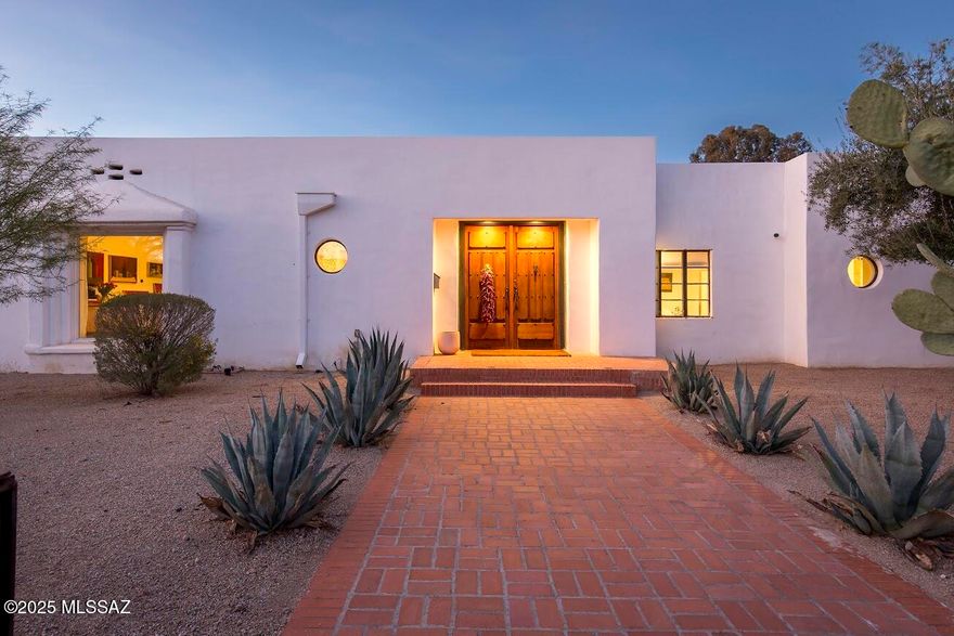 Stunningly remodeled historic adobe home & casita in historic Blenman-Elm on a double corner lot, with enough space for family & guests, and style that shows exquisite taste. Built in 1937, with hardwood floors, soaring ceilings, four bedrooms, 5 baths, remodeled with no expense spared. This home will impress your buyers looking for something warm and livable, light-filled and stylish. Taken down to the studs, all new electrical, plumbing, re-visioned rooms and floorplan. Additional thought given to the future: plumbing and electric run to the east side of the home for a second primary, gas added to the kitchen, behind the top-of-the-line induction and convection range.  A sparkling heated pool was added to the backyard. Owned 10.6kw solar system, upgraded 400 amp panel. A modern treasure