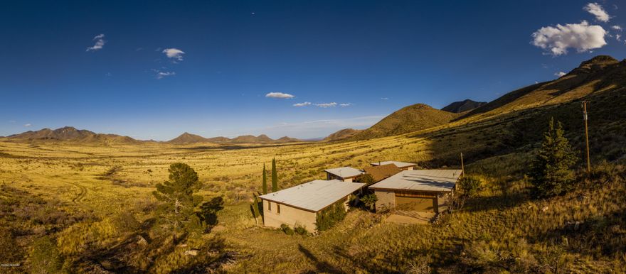 Welcome to this lovely 3 beds, 3 baths home in a 3049 sq ft area in Arizona. Stepping inside this lovely home gives the feel of owning a dream home. This house is for those that enjoy life in a quiet and serene environment. It sits in a 3,049 sq ft area in a landscape surrounding 196 acres of Mustang Mountain Ranch.
This brick home has plenty of space both inside and outside. No room in the house lacks in space from the living room, kitchen, dining, bedrooms to the 3 bathrooms.
From the entrance, you are met by hand-scraped mahogany wood flooring spreading across the living room, the balcony and the bedrooms. The kitchen and bathrooms are tiled for easy cleaning and to maintain a modern look. The living room has huge windows letting in ample natural light. The windows also provide a good view of the Mustang Ranch and the surrounding environment as well.
One of the most important rooms in a house is the kitchen. This kitchen has been remodeled with granite countertops making your cooking and cleaning as easy as possible. The kitchen is also spacious with multiple storage cabinets to help you unclutter the kitchen and evenly organize all your kitchen supplies. The kitchen also has updated appliances including a large refrigerator huge enough to store months of supplies and keep them fresh.
Each of the three bedrooms have unique baths with fresh matching fixtures in each of them. The baths are well lit and all tiled as well. The spacious bedrooms all have spacious closets making clothes storage easier and helping keep the rooms tidy and uncluttered. The master bedroom has a window with amazing views of the ranch and the upper windows provide ample amount of light in the room. All the bedrooms are also naturally lit reducing your electricity usage during the day.
When we talk of exclusion, quiet, peace and calm, this property excels. Its entrance has a driveway from the highway leading to the main door excluding you from the noise on the road. Wake up from the sound of birds chirping and tweeting around you and not the sounds of noise and blaring horns like in the city. Think of a home where fresh air is in plenty with zero pollution and noises.
This property is ready for viewing and you can simply email or call us to schedule a viewing.