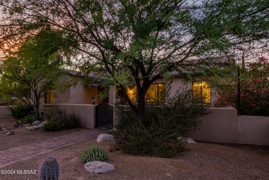 Instant CASHFLOW, beautifully updated, corner lot, sought-after Sam Hughes!(Guest house currently rented for $1,465/mo). A fenced front yard with desert landscaping and a gated courtyard greet you. Inside, an L-shaped great room, original oak wood floors, fresh neutral paint throughout, and abundant natural light awaits. The modern kitchen has cherry cabinets, leathered granite counters, stainless appliances, stylish backsplash, and a breakfast bar. The primary suite features a wood-burning fireplace, backyard access, a private bathroom, and direct laundry room access. Enjoy a paved backyard with a covered patio, mature landscaping, outdoor kitchen w/Ramada, gas fire pit, and 10x20 workshop. Guest house Is has a full kitchen, pendant lighting, open living areas, a bath, and stacked laundry. Both units were recently vacated.This has been a long term student rental for the owners children as they went to the University. Rental demand for this property is high. Previous rents were $2,995/mo for the Main House & the guest house is currently rented for $1,465/mo until March 2025. Tenants paid utilities.