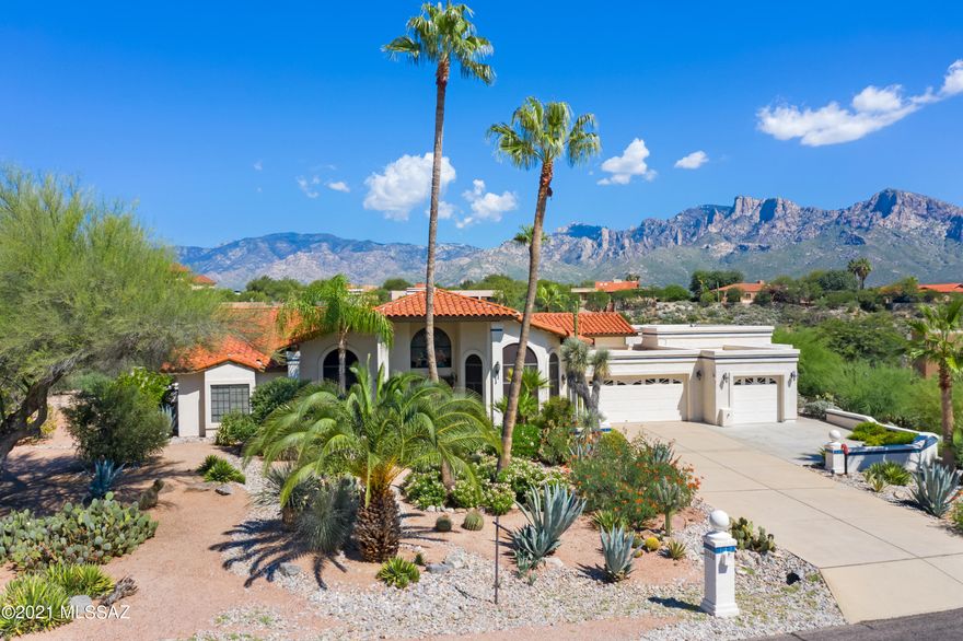 Enjoy panoramic mountain&desert views from this spacious, premium property! Inviting courtyard entry welcomes you! Formal living/dining room w/expansive view windows.  Bright, open family room w/FP & large windows, vaulted ceilings. breakfast nook, granite countertops, alcove ceiling, lots of cabinets. Master suite features garden tub, dual sinks, granite counters, separate shower! Entry from master bath to exercise room/multi-purpose complete with ½ bath. This home also has casita w/separate entry-Murphy bed, kitchen, full bath. Casita&Fitness room have Pella windows. Resort like backyard perfect for outdoor entertaining-built-in BBQ&fireplace, pool table, ceiling fans, pool, waterfall, volleyball court & winding staircase to view deck!