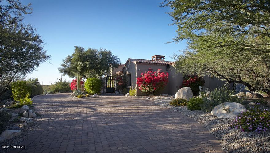 Exclusive Prime Location 
Behind 2nd Gate in Pima Canyon Estates : Lush Private Lot  : Stunning Mountain & Sunset Views :  One of A Kind : Gracious : Stylish  : Inviting  Mediterranean : Architect : Ron Robinette : 4 Bedrooms : 4.5 Baths : Spacious Guest Quarters : Refined Outdoor Living : Tranquil Pool : Spa & Fountain : Well-Appointed : Custom Materials & Finishes : Limestone & Granite Counters : Travertine Floors : Crestron Whole House Lighting Controls : Tesla Whole House Solar : Whole House Smart Panel : 4 Zone Nest HVAC Control : Heated Floors in Master Bath : Meticulously Maintained  : Peaceful  : Relaxing : Private :  Stunning Views : Please Enjoy Photos : Call for a Showing Appointment