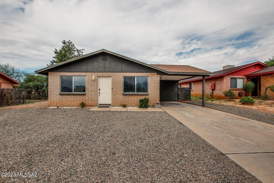 Mountain Views!  They look so much closer in person than in the photos.  Go see for yourself!  Accent wall painting adds to the other touches the seller has done, including those new kitchen hanging lights!  Great 3 bedroom, 2 bath home. Ceramic plank tile floors and new carpeting.  Room to park your RV and NO HOA!!