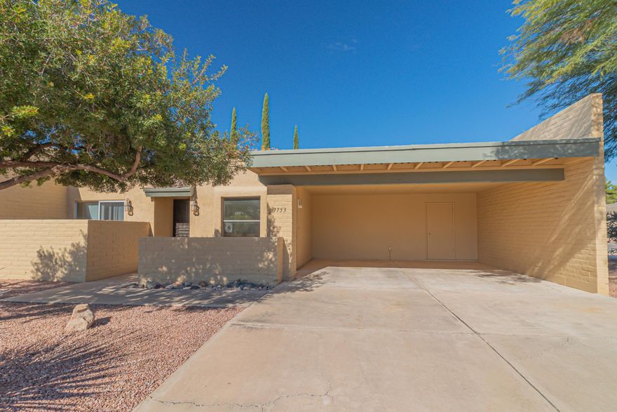 This charming and most welcoming townhouse sits nestled in the fantastic city of East Tucson! Enjoy a new roof that comes with a warranty! Upon entering this home, you are greeted with gorgeous tile. The kitchen is the perfect size to create a great meal! Enjoy a spacious living room and separate dining area. This home offers a spacious master bedroom and private bath! Enjoy an additional bedroom plus a den that would be the perfect space for an office. Step outside to your spacious backyard perfect for grilling or watching the kids or pets play! Do not let this home slip through your fingers! Put it on your list to see today before it's too late!!!