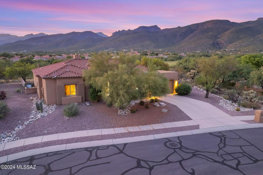 Immerse yourself in unbelievable mountain views from the best lot along the 13th fairway of AZ National premier golf course! Experience the privacy as if you are living on multiple acres, but only maintaining a fraction of it! Worry free living  as current owner has already taken care of the big items- Replaced HVAC  2 newer Lennox A/C (1.5 years old), Replaced Roof (1 year ago), water heater (1.5 years old), new refrigerator,  new interior paint and new exterior paint!  Don't let this opportunity get by!
