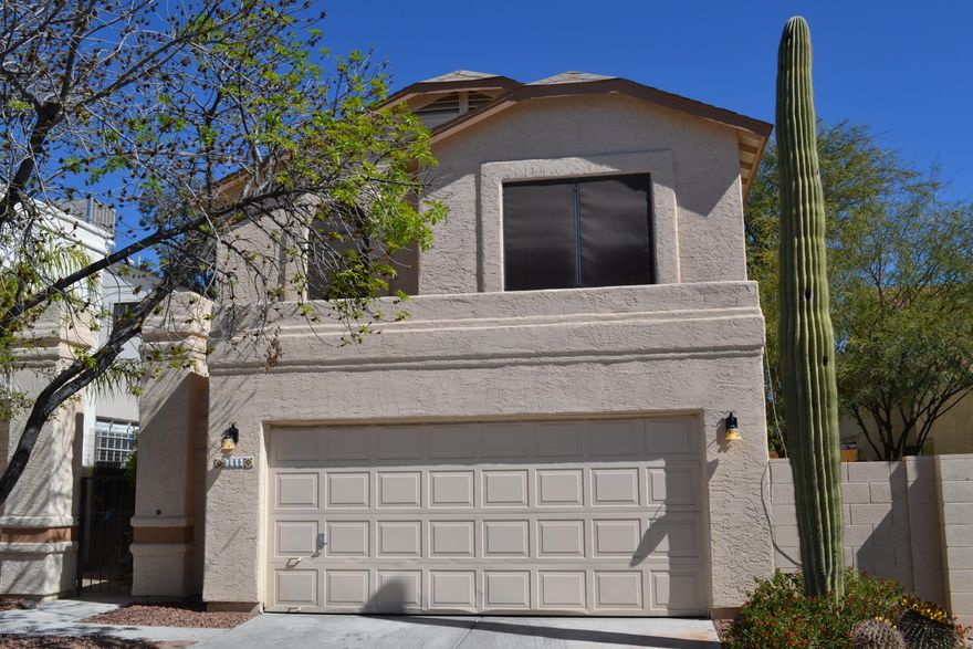 WOW! This fantastic two-story three-bedroom, 2 1/2 bath home in Star Trails is move-in ready! Vaulted ceilings, newer paint & carpet, granite kitchen counters, newer stainless steel appliances, lots of canister kitchen lights, large dining room off kitchen, and enclosed back porch bonus-room with French doors leading to the backyard Gazebo & mature vegetation!  Newer A/C. SolaTubes. Ceiling fans T/O. Sun screens on the windows cut down on power costs! Cozy wood-burning fireplace in the living room. Lots of storage in the enclosed bonus room & shelves in the garage. And your very own Saguaro cactus in the front yard!  Private community pool. Close to shopping, golf, schools, and the freeway. Great neighborhood with low HOA is convenient to everything! RV & boat storage available for a fee.