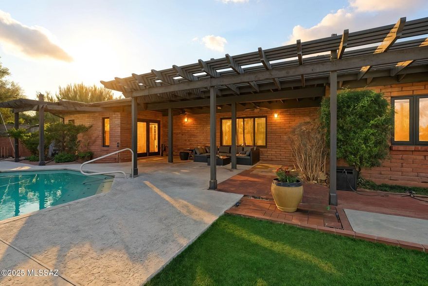 Nestled in the prestigious Sabino Mountain community, this exclusive home offers an exceptional blend of elegance, comfort, and breathtaking desert scenery. Step inside to discover a thoughtfully designed living space featuring new baseboards throughout the home, an open-concept layout, and a chef's kitchen with granite countertops, stainless steel appliances, and generous cabinetry. The living room has been beautifully upgraded with new recessed lighting, two new lamps, and a stylish ceiling fan, creating a warm and inviting atmosphere. The home also boasts new light bulbs throughout for a bright, refreshed feel, and a new master bedroom vanity light fixture, adding a touch of sophistication to the primary suite. A private guest suite on the main level provides convenience for visitors, while the spacious primary retreat offers serene views and luxurious comfort. Step outside and experience a true desert oasis  complete with a sparkling pool featuring a newly upgraded 1.5 HP pool filter pump, outdoor patio furniture, and an 8-person dining table in the BBQ area perfect for entertaining. The front yard has been enhanced with new plants, trees, and two charming garden benches, elevating the home's curb appeal and welcoming aesthetic. With its prime location near Sabino Canyon, top-rated schools, and easy access to Tucson's best shopping, this home is an extraordinary opportunity to own in one of the city's most sought-after Foothills neighborhoods.