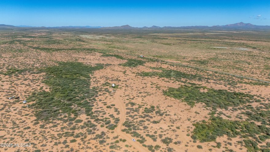 35.968 Acres - Off-Grid Living in McNeal, AZ
 Escape to peace and wide-open views on this nearly 36-acre property in McNeal, AZ. Fully fenced and set against a stunning desert backdrop, this land offers the perfect setting for off-grid living or a self-sufficient retreat. Not far from the Whitewater Draw refuge with fabulous wildlife and birding opportunities, and centrally located between Bisbee, Douglas, Elfrida and Tombstone. A Mennonite-built storage shed has been thoughtfully converted into a tiny home, complete with a metal roof, a place for a wood-burning stove/fireplace, and attic storage space. The layout provides room for a bedroom, living area, and kitchen. A propane-ready stove is in place, ready to be connected to your tank for cooking convenience. The property includes a capped well (no lines installed) and a 1,500-gallon water catchment storage container. While there is no septic system, the current owners utilized an outhouse with a bucket "humeposting" setup. No solar or electric is currently installed, but power lines run along Davis Rd, allowing for future access if desired.
This land is part of a Property Owners Association, with a low annual fee of just $120 that helps maintain the roads. Horses are welcome, and building restrictions are minimal, offering flexibility to design your ideal homestead.
Whether you're seeking a quiet weekend escape or a full-time off-grid lifestyle, this property provides the space, freedom, and natural beauty to make it your own.