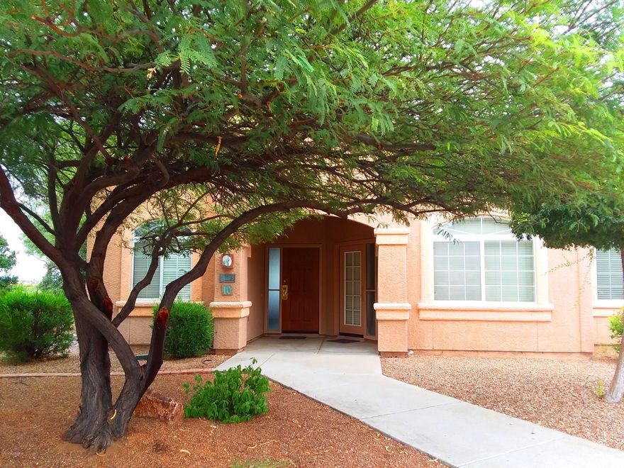 Light filled, furnished Townhome is perfect for full time living or as income property.  Has two entrances which enables you to rent as one or two units or, if you prefer, live in half and rent out the other!  Many possibilities. Nice, bright kitchen has breakfast bar and is open to the great room which looks out over the arroyo and mountain view.  Has 2 spacious master suites.    The guest suite/lock out unit has mini kitchen with frig, microwave and roomy sitting area to just relax.  Back covered patio lets you watch the local wildlife and enjoy the beautiful view of Mountains.