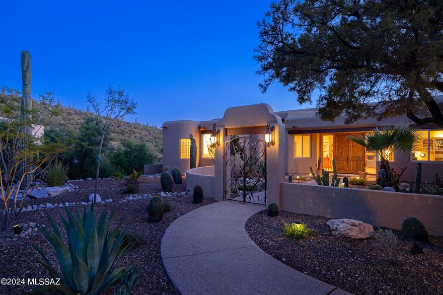 Sweeping views of the mountains and city lights from this stunning Alta Vista retreat perched high on a corner lot. Walls of windows bring natural light and picturesque sunset views into this spacious retreat. Features included beautiful travertine floors, split floor plan, high ceilings. Chef's kitchen is the heart of the home w granite island, custom cabinetry, SubZero fridge, Thermador gas cooktop, Dacor double ovens,eat at bar which opens to the spacious family room w/corner fireplace. Wonderful living room and dining area w stunning travertine accent to fire place, also  featuring a full bar w seating, perfect space for entertaining. Enjoy gorgeous sunsets & unobstructed city views from the patio & sparkling pool and spa.  Spend evenings around the outdoor cozy fireplace. The grand primary suite features fireplace, the spacious primary bath includes a jetted tub, separate shower, dual vanity, and oversized walk-in closet. 4 Spacious bedrooms w/2 set up as of offices  featuring custom built ins and a Murphy bed complete this gracious home.  Don't miss the 6 car garage, 3 bays, 2 deep with storage room and more. Seller owned solar panels for the home installed. Solar shades installed on west side of home.