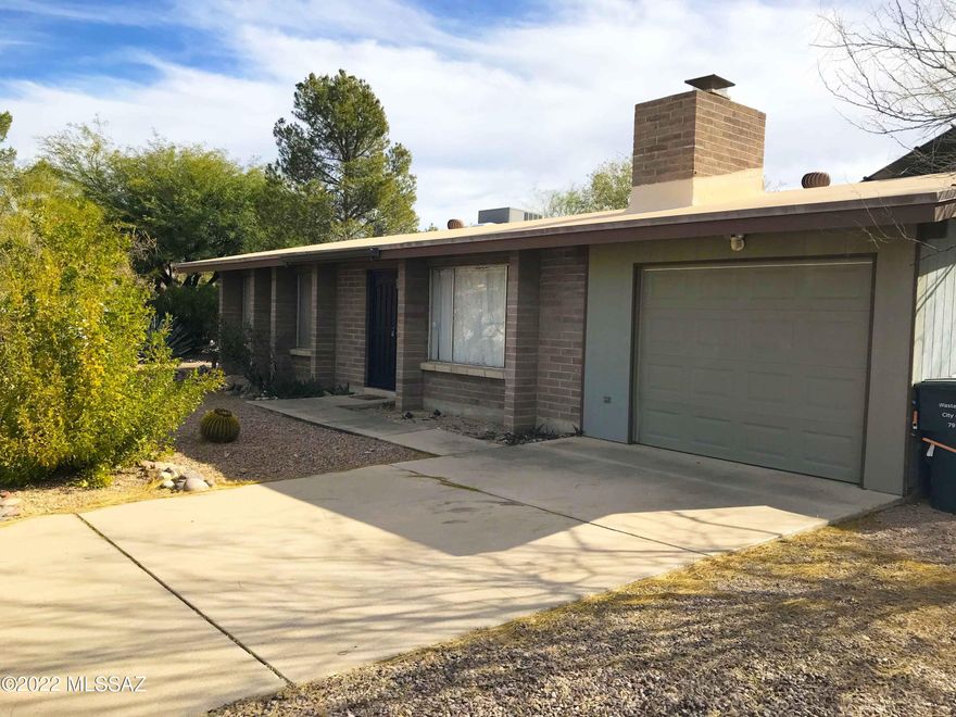 Please Do Not Disturb Tenants. This Charming home features 3br/2ba, fully tiled floors tucked along Tucson's Starr Pass Hills. Dining area off Kitchen. Kitchen with Oven/Stove, fridge & separate pantry. Wood burning Fireplace in the Living Room. Washer & Dryer. Covered & screened patio & block fenced backyard. Storage & Laundry Room off Garage. Gorgeous mountain view the from front living room. Close to Starr Pass Golf Course, trailhead, PCC West Campus, easy access to the UofA, Banner Medical Center, downtown & the freeway. 2 small pets Ok. This is a must see home for rent! Non Smoking Home. Renter's Insurance required.