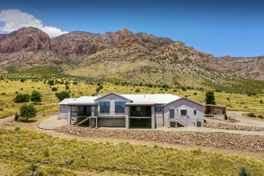 Spectacular Portal, Arizona! A custom, self-sufficient residence nestled in the beautiful Chiricahua Mountains. Stunning 360 degree views of the majestic Arizona Chiricahua Mountains and New Mexico's Peloncillo Mountains. Unobstructed views of the Milky Way, stars and planets, with an occasional satellite passing overhead. A stargazer's paradise! This residence is surrounded by hiking trails and numerous species of wildlife and borders US Forest Service and Arizona State Lands. Located fifty miles north of Old Mexico and seven miles west of the New Mexico state line. Possibly one of the most beautiful and scenic locations in the  Southwestern United  States.