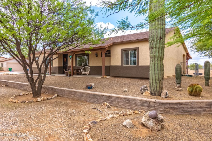 Amazing Avra Valley property with what you're looking for.  Over an acre with no HOA, mountain views from the property, quiet enjoyment with tons of room for RV Storage, entertainment, and growth.  This 4 bedroom 2 bath split floor plan 1870 sqft home has great energy, and a lovely layout.  The large kitchen has all the countertop space you need including a built in work station. The oversized patio runs the length of the house and provides loads of room for entertainment and relaxation.  This home qualifies for 100% USDA financing! 100% Fin / $0 Down Pmt / Low MI / Low Rates!