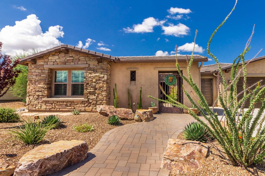 Gorgeous Tesoro Model, with Over $250k in Upgrades & Guest House in Saddlebrooke Ranch, Tucson's #1 Active Adult Comm. This Models Base Price New is approximately $408k+ per web site. Fantastic Backyd for Entertaining, w/Covered, Extended Paver Patio & Ramada, Built in BBQ Counter, Hot Tub & Great Golf Course Views. Contemporary Great Room w/Picture Window Brings Outdoor Living Inside & Features Stacked Rock Wall Entertainment Center w/Dry Bar & Beverage Fridge. The Gigantic, Quartz Breakfast Bar w/Pendant Lighting Separates Kitchen from Great Rm & Huge Dining Area w/Sliding Doors to Patio. Kitchen Features, Two Ovens, 5 Burner Gas Cooktop, GE Monogram SS Appliances & Hood, Tumbled Travertine Backsplash, Natural & Dark Cherry Cabinetry, Butler Pantry w/2nd. Dishwasher + 120-150 Bottle Wine Fridge. Den w/French Doors is Extended 3 Ft. Spacious Master with Door to Patio, Boasts, Walk-in Shower w/Two Heads, Two Vanities Separated by Make Up Vanity Plus His & Hers Walk-in Closets. Guest Rm w/Bath, Laundry Rm w/Sink & 2.5 Extended Garage Complete this Home. Don't you Deserve to Retire in Style?