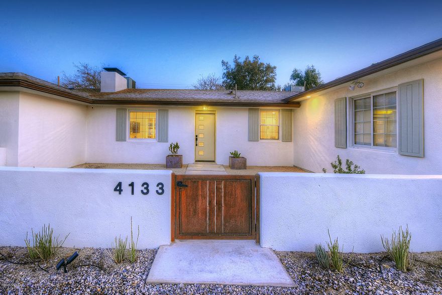 Mid Century in Poet's Corner! 2764 sq ft home, originally designed by Arthur Brown.  This Modern  home is thoughtfully & beautifully  renovated with 4  large bedrms & 4 & bathrms.  Master bath & 3 bedrooms have en-suite baths.  Colored concrete floors, originally designed with a wall of windows to the large Arizona room.  Remodeled & timeless kitchen with custom slab cherry wood cabinetry, Side by Side Refrigerator & Freezer, stainless steel appliances, black slate counter-tops.  Large butler's pantry with extra storage  and separate office!  Replaced in 2012 : Water lines, Main line, sewer line, wiring, Roof and more see upgrade list in documents! Walled and private, huge backyard w/mature trees, garden space, turf and MT. view. Large 638 sq ft garage! Plus off-street parking!