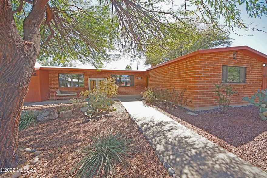 Classic Mid-Century Burnt Adobe with pool in coveted Glenn Heights! Recently painted inside, remodeled kitchen & baths, tile flooring throughout, wood doors, move-in condition. Re-plastered pool and gorgeous private yard, newer A/C and heat, newly recoated roof, dual paned windows throughout. 2-car garage with workshop alcove.  Large, modern 2-car carport as well. Owner is a licensed real estate broker in Arizona. Older, established neighborhood is quiet and very convenient to supermarket, stores, restaurants, bank, yoga studio and movie theater!