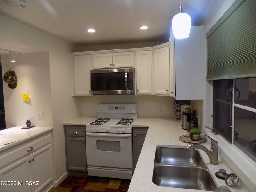 Time to downsize??....Fantastic Remodeled Home in the desirable Community of Haven Green Valley. Crisp fresh palette, ceiling fans, newer floors, window shades, & plush carpet in all the right places. Stunning quartz kitchen counters, under-mount sink, breakfast bar, upgraded lighting, pantry, & white upper cabinets w/gray lower cabinets. One large bedroom, ample closets, tastefully updated bath, & laundry closet. Backyard paver patio & covered patio for outdoor entertaining! Community Pool, Putting Green, & Sidewalks. Take a tour today!