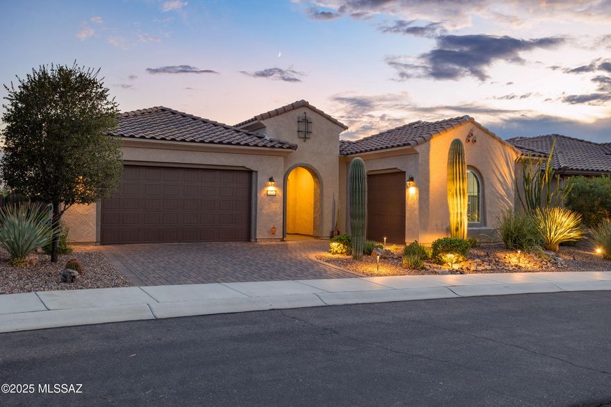 Live the ultimate resort lifestyle in this upgraded Journey model located in the +55 Del Webb Dove Mountain community. This 2 bed, 2.5 bath home with owned solar, and a den, also features a chef's kitchen with built-in refrigerator, extra cabinetry, and wine fridge—perfect for hosting. The owner's suite offers a sleek glass walk-in shower, while the private guest suite boasts a marble-tiled bath. Outside, enjoy your desert retreat with a 3-car garage, pool, spa, built-in grill, beautiful fire pit, landscape lighting, and panoramic views. Del Webb offers endless activities—swim, play pickleball, join a bocce league, or connect with neighbors at the vibrant Rec center. Every day feels like vacation in this home designed for elegance, comfort, and fun.