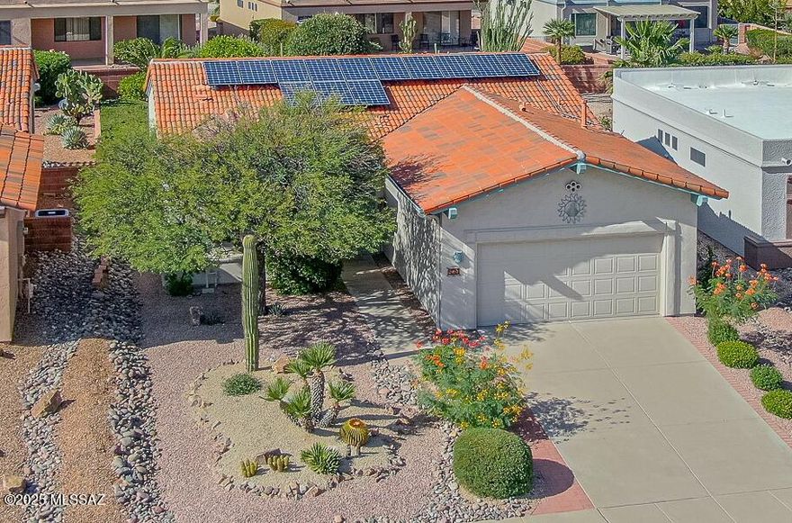 Charming Las Campanas Home, 2 Bedrooms, 2 Baths, Office/Den, Enclosed Patio and an Extended Garage. This home has so many great features: Granite Countertops, Tile Floors, Stainless Appliances, there is a Laundry Hook-up in the Laundry Room and the Garage, just too many features to list all. The Roof was replaced in 2020; The Heating and Cooling was Replaced in 2020 and there is an Owned Solar System (installed 2021). Must See!