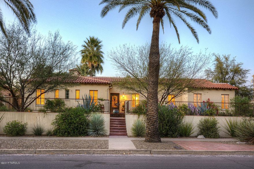 Spanish Mission, triple brick, historic, 1936, Sam Hughes home designed by M. Starkweather.  Perched on a large lushly landscaped.36 ac corner lot.  Impeccably restored & remodeled to perfection.  Hardwood & Stone title floors, 10’ ceilings throughout, new dual pane casement windows, 2 stately fireplaces, exquisite new kitchen includes granite counter tops, stainless steel appliances, Lots of cabinets & storage. 3 bedrooms plus a den.  Master bedroom with corner fireplace en suite bathroom, double sinks, large walk in closet. A separate office/workout room.  Dramatic backyard with an elevated Pebble Tek pool & fountain.  Extremely private! 2 car garage. Historic register provides a reduction in property taxes.