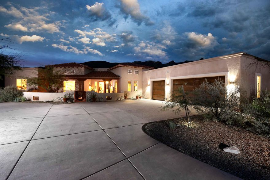 TAR Tour Winner! In spectacular, gated Fetzer Ranch/Saguaro Hills, this beautiful, 3.3 acres,3,340 sq ft home & fabulous 1,000 ft GUEST HOUSE is one of the best the NE has to offer. A very private retreat nestled near the base of the Santa Catalina Mtns where you'll enjoy a resort-like lifestyle complete with championship golf & walking, hiking & biking trails. Layered covered & uncovered patios offer multiple locations from which to marvel at the nighttime stars & valley lights or to relax spa/poolside or fireside. The impressive ez flow floor plan boasts hi ceilings, great rm, DR, 3 bdrms +den/office, 3 baths & open concept kitchen for eze of entertaining. The separate one bdrm guest house also has spectacular views & FP & easily converts to media/studio. Simply the best of everything