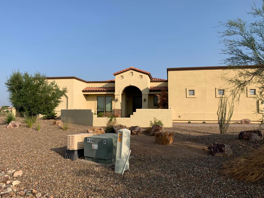 Pride of ownership & attention to detail make this the perfect home to weather the Covid-19 pandemic. Movie theaters & pools are closed but don't you worry. This stunning home has a theater room, sparkling pool, den/gym, outdoor kitchen w/natural gas and oversized covered porch with unobstructed views of the Catalina mountains. Multi-gen living needed?  No problem, there is room for a casita. Chef's kitchen w/double islands, breakfast bar, double ovens, prep sink, solid slab granite, farm sink & walk in pantry. Split bedroom floorplan provides the privacy you desire. Master suite boasts executive height double sinks, jetted soaking tub, walk in shower & oversized master closet with custom cabinetry. Large laundry room with cabinetry and room for fridge & freezer. Oversized 3 car garage.