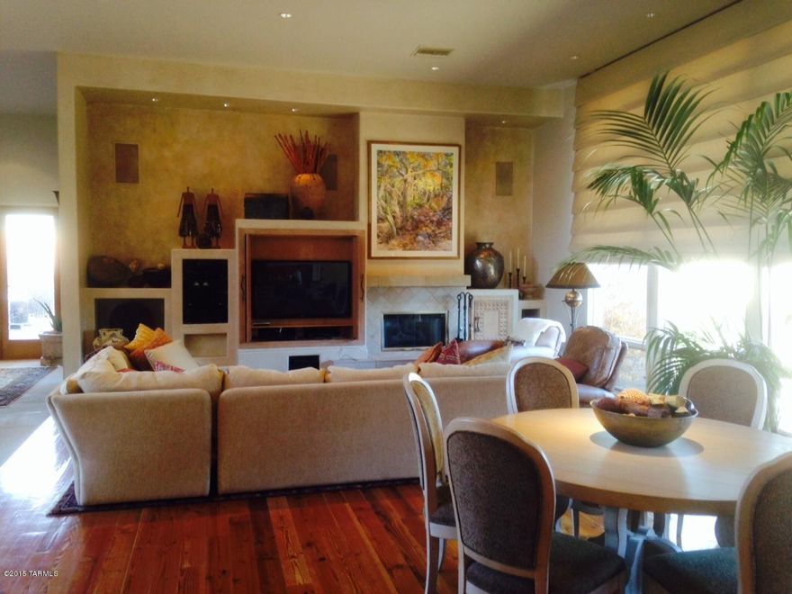 Live as if you're on vacation all the time!  Located in the World Renowned Canyon Ranch Health Resort, this incredible home allows access 365 days of the year to state-of-the-art fitness, medical & spa facilities as well as gourmet dining!  This home is on a rare, approximately 1/3 acre lot located in the center of Canyon Ranch boasting just a short stroll to all the main health and spa facilities! Warm & elegant open floor plan boasting 3 bedrooms and 4 baths with spacious master retreat including unique double master bathroom with 2 showers, 2 toilets with bidet, and two separate vanities and large walk-in closet connecting the two areas. The house interior presents soaring ceilings as you enter and a perfect blend of natural wood and stone flooring throughout.  Chef's kitchen with Viking stove & floating island w/ ample prep counter space/breakfast bar & walk-in kitchen pantry.  The entire inventory of furnishings and accessories in the photos are included in the sale of the property which makes it virtually turnkey!  The outside features almost a 1/3 of an acre lot with three separate yard spaces; one off master bedroom & 2 off the living room/kitchen with rare 30' heated lap pool/separate spa & spiral staircase to upper observation deck gives incredible 360 degree mountain and Sabino Creek views.  The home is exceptional and is located in a unique area of Canyon Ranch where it is a convenient short walk to all Canyon Ranch spa and health facilities and having the garage allows for golf cart mobility and separate car for those city outings.  Also, just outside the front door a few steps is the 2 mile walking loop which is a popular central fitness stage to Canyon Ranch which allows guests and homeowners to walk/run and take in much of the beauty of the 150 foothills acres in which Canyon Ranch has to offer!