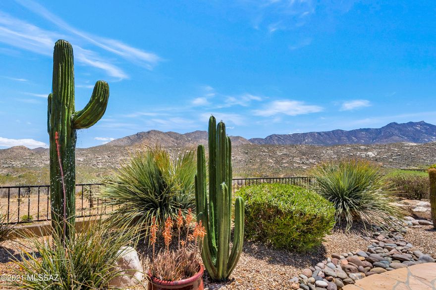 We're Proud to Present an Upgraded Santa Fe Dakota with Attached Guest House, Owned Solar & Panoramic Mountain Views. This 4 Bedroom / 3 Bathroom / 2,819 SF / Ext. 2 Car Garage Home is just what you've been waiting for! All windows replaced (except 2 sliders) in 2015 by Renewal by Anderson. 36 Owned (9 kW) solar panels. Upgraded Gourmet Kitchen with granite countertops, gas cooktop, 2 dishwasher's, double oven, Sub-Zero refrigerator/freezer, large island, & custom cherry cabinets. Family Room off kitchen with gas fireplace & wine refrigerator. Owner's Suite with mountain views. Extended & expanded 2 car garage with utility sink. Private & Gated Yard. Covered patio with electric rolling shade. Extended patio with flagstone, firepit, built-in BBQ, 2 stone Cactus fountains & mountain views.