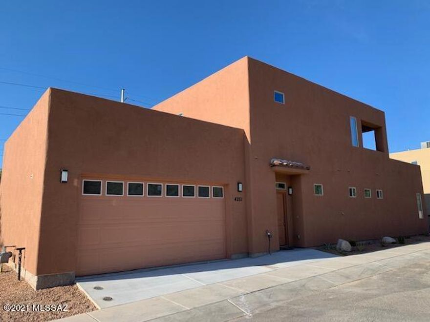 Stunning Mountain Views await you in this Beautiful Brand New 2 story Home in the Sabino Shadows Community! The spacious downstairs owner's suite includes a large bathroom with separate vanities, granite counter tops, large tiled walk-in shower, and a walk in closet conveniently equipped with a stacked washer and dryer. The Galley kitchen has plenty of cabinet and storage space and includes granite counter tops and SS appliances. Dining area with wine bar includes sink and mini-fridge. The 2 upstairs guest suites each have access to outdoor covered balcony. They also share a bathroom with walk in shower, and laundry closet with a stacked washer/dryer. 2 car garage with extended ceiling height. Enjoy outdoor covered patio with beautiful brick pavers. This Gorgeous home won't last long!