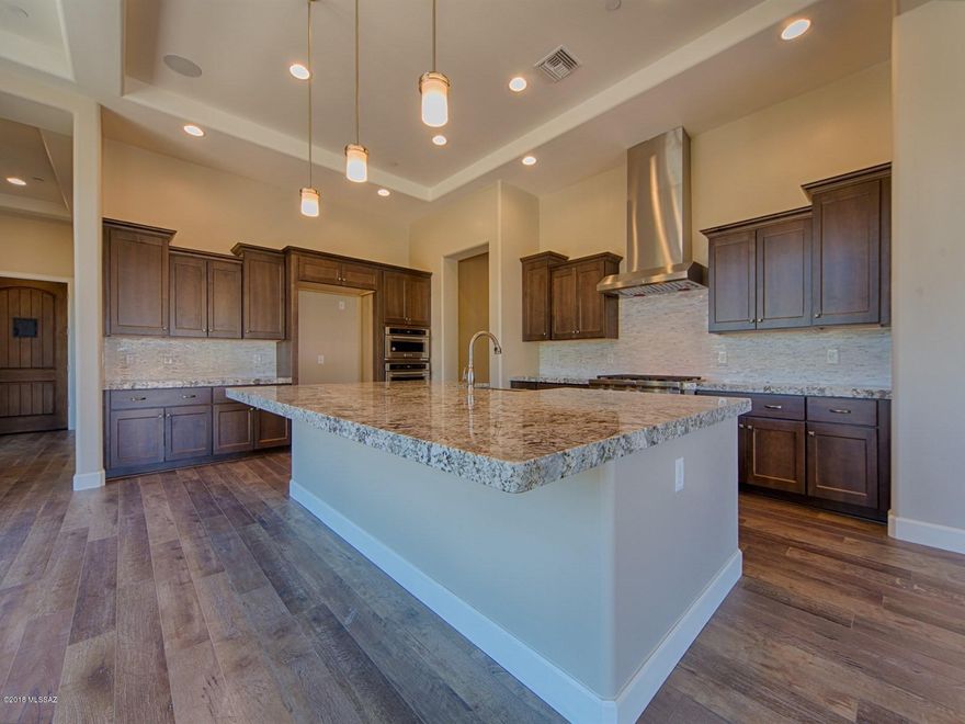 Brand NEW energy-efficient home ready NOW! The stunning Mesquite is surrounded by natural rock out croppings. A luminous kitchen overlooks private courtyard and adjoining dining and great room. Grand master suite and full secondary suites provide restful sanctuaries. Interior features include karman cabinets, corner multi-side door, 42'' fireplace, and many more luxury features. Love living in the gated community of Stone Gate at Stone Canyon with the beautiful golf course. Known for their energy-efficient features, our homes help you live a healthier & quieter lifestyle while saving you thousands on your utility bills.