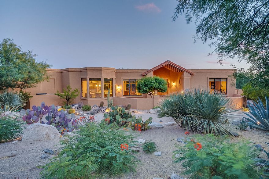 Tucked away in the highly desirable Canyon View Estates, This stunning home features majestic views of the Catalina Mountains, city views and the serenity you seek. Featuring 4 oversized bedrooms, 3 beautifully updated bathrooms, 3 car garage and plenty of storage, this home has it all. Enjoy the amazing Tucson lifestyle in your own lush personal oasis. Take a dip in an infinity edge pool or relax in the spa. This home has been meticulously maintained and is truly a rare find. Call to schedule your private showing today.