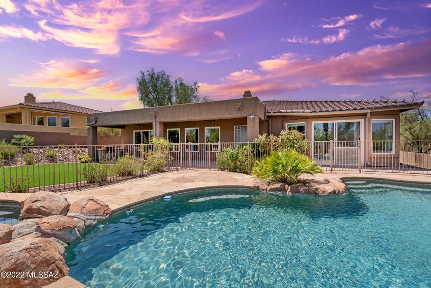 This beautiful 4 bedroom with 3 full baths has a guest quarters and it's located in desirable Vistoso Ridge. Kitchen has granite counters, stainless 42'' maple cabinets, gas fireplace, soaring 10' ceilings, custom shutters, and huge master bedroom retreat with sitting room. Custom organizers in all bedroom closets and laundry room, 3 car garage w/storage cabinets. Backyard is an oasis with a stunning pool, spa, built in BBQ and flagstone deck. Solar heater for pool. Summer time, enjoy the high pressure misting system on your back patio. Surround system inside & out. A must see!