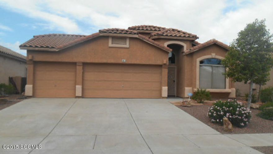 Here is that scarce four bedroom ranch style home that your have been waiting for! This wonderful residence has it all. From the tile roof to the mature landscaping it is a low maitenance lifestyle that you and your guests will enjoy for the years ahead.