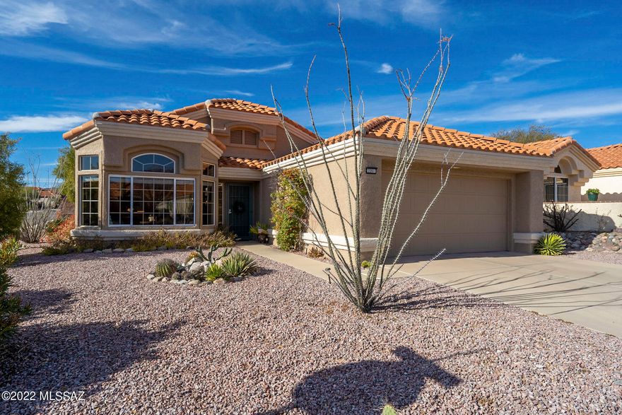 You'll feel right at home upon entering this beautifully updated Sonoran Model in coveted Sun City Oro Valley. The stunning views of the Catalina Mountains from the living room & formal dining room will take your breath away. You'll enjoy the freshly painted nook and chef's kitchen with updated cabinets, granite countertops, large pantry and updated light fixtures. Large windows and sliding door
to the back patio bring a lot of natural light into the home. Enjoy your private, covered patio right off the kitchen and owner's suite, and entertain your guests on the extended patio with mountain views. This home boasts a split-bedroom floor plan for more privacy, plus updated flooring and baths. Owner's suite has en-suite bath with dual vanity and storage cabinet, plus large, walk-in tiled shower. Owner's suite also has 2 closets and sliding door to the back patio. Exterior was painted in 2020. This special home won't last long. Begin your active adult lifestyle in Sun City Oro Valley today!