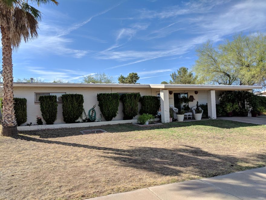 Home is located in a nice neighborhood where pride of ownership is evident. Bright sunny living space. Stainless steal appliances. The home has a front & back yard sprinkler system, 1.5 car (pull-through) garage with front and rear doors, extra storage room, fenced back yard & covered patio. Must see to appreciate. USDA Loan eligible!
