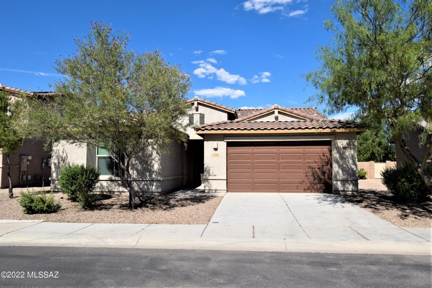 Come see this barely lived in home. Back yard is complete with large patio overlooking major green belt/park area and faces East for all day shade. The gourmet kitchen upgrade complements the large island and makes for a great entertaining space! Priced lower than you can purchase, and ready for a new renter!