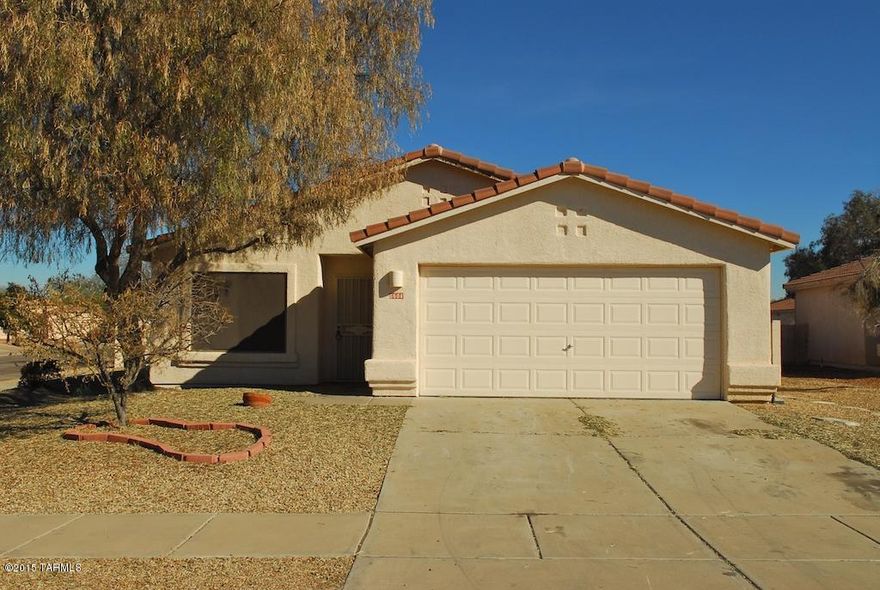 Awesome home with a large master bedroom and bathroom with a garden tub. Granite counter tops in kitchen and ceramic tile where it counts. Extended covered patio and low care landscaping. Don't miss this one!
