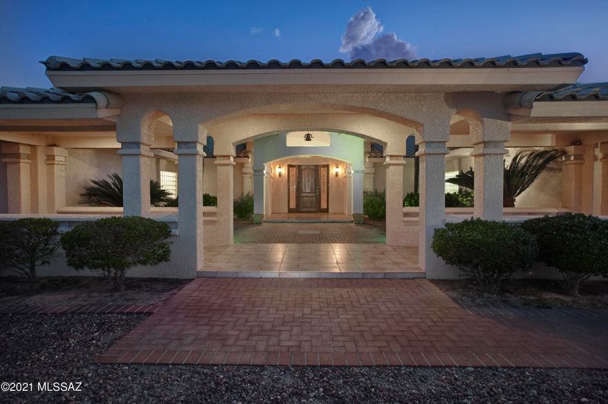 Over 3,600 sf on TWO ACRES in Casas Adobes! Large, approx. 15x20' Master Suite w/ walk-in closet, 2 OVERSIZED bedrooms approx 15x15; w 2.5 BA!  Wonderful opportunity to COSMETICALLY UPDATE a 1998 solidly built home.  Open plan, soaring LR ceiling w/ inviting ambiance of tray lighting in LR, DR, Master BR; wide hallways.  Dream kitchen off Large Fam Rm and gas burning fp.  Enclosed BONUS ROOM off garage w/ AC, window, door (no closet). 2 easy steps into LR, dual pain windows, carpet & ceramic tile thru-out. Huge backyard w/ vast shaded patio, tranquil green lawn w/ water feature. NEWER landscape irrigation w/ PVC pipes! 2 AC units, 2 water heaters, NEWER insulation, recent roof repairs, cent vac, alarm system. Live-in ready.  Third garage bay w/ CAR LIFT, WORKSHOP.  Sold as-is.