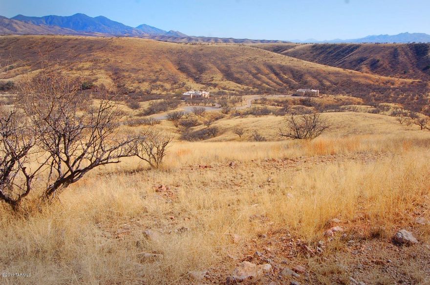 Dramatic 4.28ac HILLTOP parcel w/PRIVATE WELL & an earlier (successful) PERK TEST.  You'll enjoy OUTSTANDING VIEWS of the Patagonia, Pajarito, Atascoso & San Cayetano Mtn Ranges & FAMOUSLY DARK, STAR-FILLED EVENING SKIES from this beautiful spot. At the corner of Javelina Ct & Circulo Montana, ROADS ARE PAVED & access is excellent. Surrounded by lovely homes & welcoming neighbors, it's a SAFE, SERENE high desert setting that's perfect for year-round living. Bird & wildlife viewing is a given & LK PATAGONIA STATE PARK is appx 1 mile away ~for boating, hiking, fishing, swimming... This setting offers the desired benefits of living rurally in SE AZ: nearby shopping, entertainment, wineries, golf, historic sites++ are conveniently close in ALL directions; south Tucson is but 1 hour north.