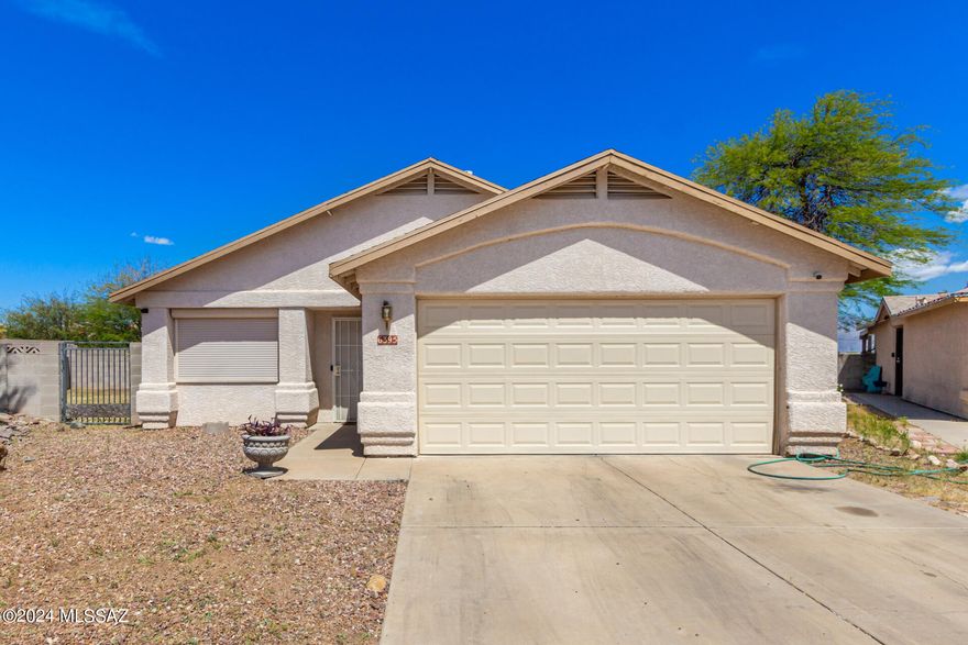 Looking for a beautiful 3 bedroom home with 2 living spaces on a large lot?  This home may be for you!  As soon as you walk in you will enjoy the vaulted ceilings, and tile floor that is throughout the entire home!  The backyard offers a ton of space and is ready for your personal touches.  Roof, HVAC, and water heater are all newer as well.  Come by and check this out soon.  Don't miss your opportunity to get into a home for under $300k!