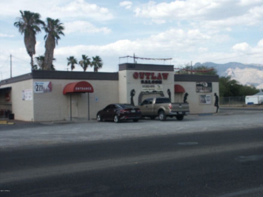 Iconic Outlaw Saloon and adjoining commercial strip located in the near NW with great visibility, parking and access. Gross monthly income approx. $8655 with a vacancy. Outlaw parcel may be sold separately. Bar business, liqourelicense and fixtures can be purchased by separate agreement. Call for full details.
