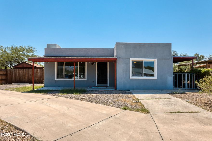 Welcome to this charming home, just 5 minutes from downtown Tucson and the University of Arizona! Perfect for a student rental or long term rental! Situated on over a quarter-acre, this property also offers ample space and the correct zoning to build an additional units- for multigenerational living or making additional income.

This home boasts 1,729 square feet of open living space, wood beam ceilings and spacious rooms with no carpet. The primary bedroom has unique french double doors, a bright space with a remodeled en-suite bathroom. The bathroom has a tile, walk in shower and a walk in closet. and connects to another bedroom. 

So many home improvements like an upgraded electrical main panel, roof Poly Membrane system 2024, dual pane windows and more, this home is move in ready