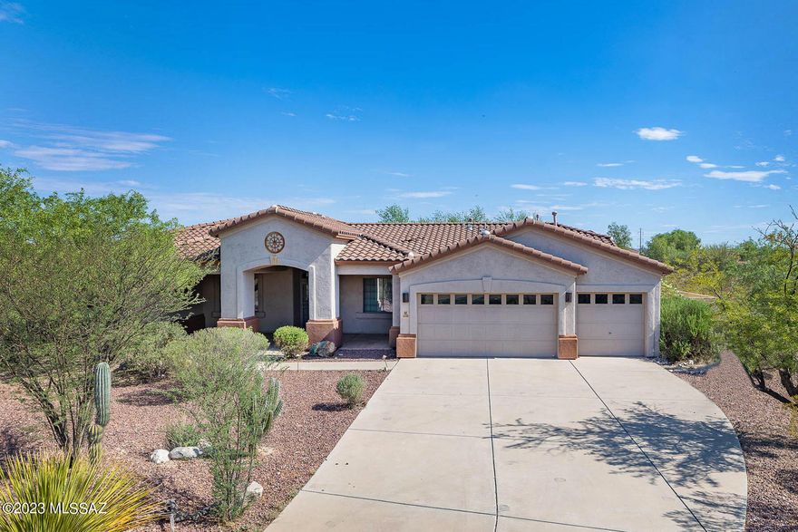Situated in a highly desirable neighborhood with lovely Catalina Mountain views this home is what you have been looking for. Great floor plan with office and sitting room. Sited on a private 2.1 acre lot with a fully fenced backyard and amazing views to enjoy the Tucson lifestyle. 3 year old roof too. Great room concept with high ceilings and gas fireplace. Primary retreat features a generous-sized closet and bath with see-through fireplace and a separate shower and bathtub. Granite countertops in chef's kitchen with island and pantry. Three car garage gives you room for all your toys. Easy access to I-10 and just minutes to all Tucson has to offer. Great neighborhood and location!