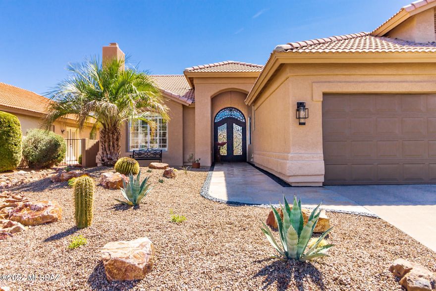 Property Description:  Stunning one story Galleria renovation on a ridge overlooking the Tucson golf course 6th hole and long range views of the Catalina mountains.  Nothing has been overlooked in this home with extensive German schmear stone fireplace and dining room focal wall, faux wood tile and carpeting, overhead beams on vaulted ceilings, state of the art kitchen renovation with Italian Bertazzoni appliances, custom wood focal walls in the office, master bedroom and bathroom, a raised patio with travertine pavers and quad panel patio doors to open the view.  Come see the custom touches in every room!
New heating and A/C.  All new landscape, irrigation and wiring and custom travertine sidewalk entryway.  Owner/Agent