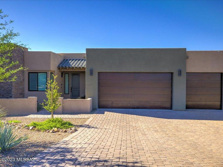 Sahuarita's beautiful and secluded Stone House development. This home was completed in 2020 but feels like new construction. The kitchens granite countertops and glass backsplash tile complement each other beautifully. All interior choices have been well thought out with a special custom touch.  The powder room has a stunning blue tiled wall to backdrop the sink. Homeowner has continuously upgraded items throughout, A whole house water treatment, recirculating hot water pump, a brand-new high-end induction range, whole home air purifier Fully landscaped backyard. Patio shades on exterior. Shades and shutters on interior windows. Black framed windows. Enclosed courtyard at entry. The view fencing that encloses the backyard makes for easy viewing of the gorgeous Santa Rita Mountain view.