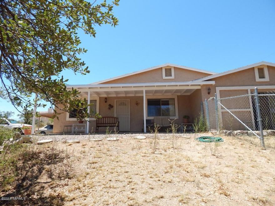 Light and bright 3 bedroom 2 bath with bonus 4th bedroom/family room. New Ac Unit, private lot, fenced dog run, covered parking, washer and dryer. Refrigerator not included.