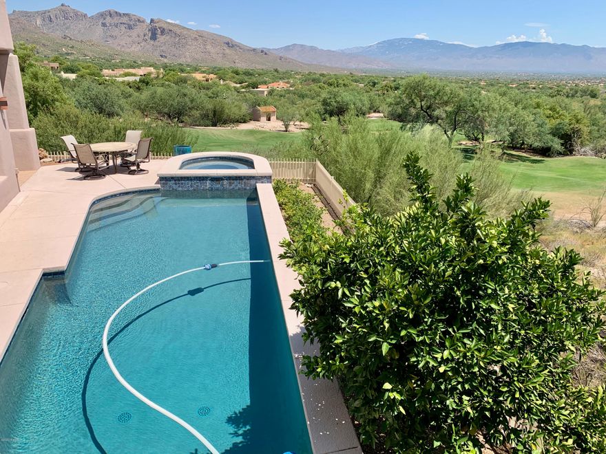 Views, Privacy and Quality abound in this Catalina Foothills Home.  Sitting high above it All, at the roads end, and on the southern edge of a Ridge Top in Ventana Canyon, this home features sweeping views of the Mountains, city, & Golf Course!  Courtyard entry leads to a spacious 3 bed, 3 bath Masonry and Steel framed Home and a lovely 1 bed/1 bath private Guest Casita. Amenities include: Views from every room, Solid Wood Doors, Great Room w/ Soaring tray Ceilings, Separate Den/Office, Stacked Stone Fireplace, Custom Built-Ins,  Large seating Island, Granite slabs, Stainless Appliances.  Outdoor living  Heated Sparkling Pool & Spa, Covered Patio Electronic Shade Screen, Fire Pit, & Stainless Grill Epoxy Garage Floors, Storage Cabinets, & Sink. Views to Golf Course Lake & Waterfall too!