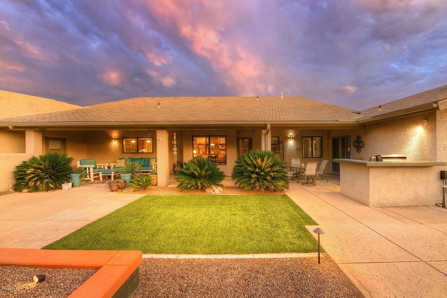 Situated to enjoy both mtn & city views, this 5BR/3BA John Wesley Miller designed home is a move in ready family home. This 3622 sq ft home boasts a formal living & dining rm, lg den w/FP, family rm that opens to an amazing  gourmet chef kitchen featuring all stainless steel high end appliances: DCS  6 burner Gas cooktop, DCS double ovens, TWO Bosch dishwashers, Sub Zero refrigerator, soapstone counters w/stainless steel backsplash, +  stainless steel countertop island, bulter pantry + room for many cooks! 5BR's are spacious, Mstr BA w/soaking tub & separate shower. Back yd w/ pool/spa, outdoor shower, built in BBQ and sink, grass, FP & amazing mountain views! 3 car gar w/3rd garage currently set up as workshop with A/C. District 16 schools. Flr pln located under photos, virtual tour.