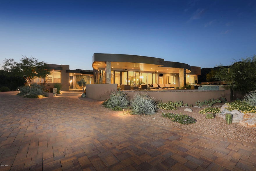 FOR VIDEO PRODUCTION FOOTAGE OF THIS HOME PLEASE CUT AND PASTE TO BROWSER: https://youtu.be/oOtn1bn1pK4  STRIKING SOFT CONTEMPORARY SOLOWAY DESIGNS HOME. EASY - THE MOST DRAMATIC VIEWS STONE CANYON HAS TO OFFER. THE CATALINA MOUNTAINS AND DOWNTOWN CITY LIGHTS CAPTIVATE GUESTS AS YOU ARRIVE. OPEN FLOORPLAN, FLOOR TO CEILING GLASS VIEW WINDOWS, GOURMET KITCHEN, ALL THE LUXURY FINISHES YOU WOULD EXPECT. TOP OF THE LINE REMOTE CONTROLLED WINDOW COVERING THROUGHOUT FOR EFFICIENCY AND PRIVACY. DETACHED GUEST QUARTERS. XL GARAGE WITH LARGE HEATED AND COOLED STORAGE OR WORKSHOP. PHENOMENAL OUTDOOR ENTERTAINING SPACE. ADJACENT LOT 168 FOR SALE. SEE VIDEO BELOW FOR TIMELAPSE OF STUNNING VIEWS. THE STONE CANYON CLUB IS A PRIVATE GUARD-GATED LUXURY GOLF COMMUNITY OFFERING A LIFESTYLE LIKE NO OTHER.