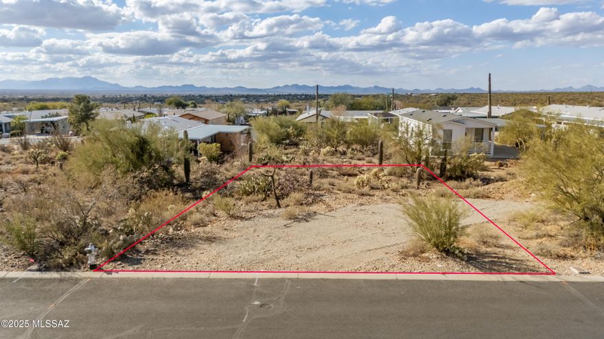 Own your lot in a gated community in southwest Tucson. All utilities at the lot line. Experience 360 -degree mountain views. Enjoy the desert fauna and flora.  Impressive sunset and sunrise views, views of Kit Peak.  Enjoy starry nights. Walking and hiking trails. Cycling trail at Cat Mountain. Close to Casino Del Sol, Spectrum Center, Desert Museum, and downtown Tucson, Install the manufactured home of your choice in the 55+ adult community. Low HOA fee. Community amenities include pool, spa, weight and exercise room, recreation room, game room, library, Billiards room, Bocce ball, Tournament Shuffleboard, ramadas and more.  Comm events include adventures in eating, artistic techniques, artists palette, bingo, bocce ball, bowling league, game night, hiking, hooks & needles, movie night, ping pong, poker, quilting, shuffleboard, coffee club, and more. The lot at 3324 S Spectrum is also listed for $50,000.  Website - CopperCrest.net